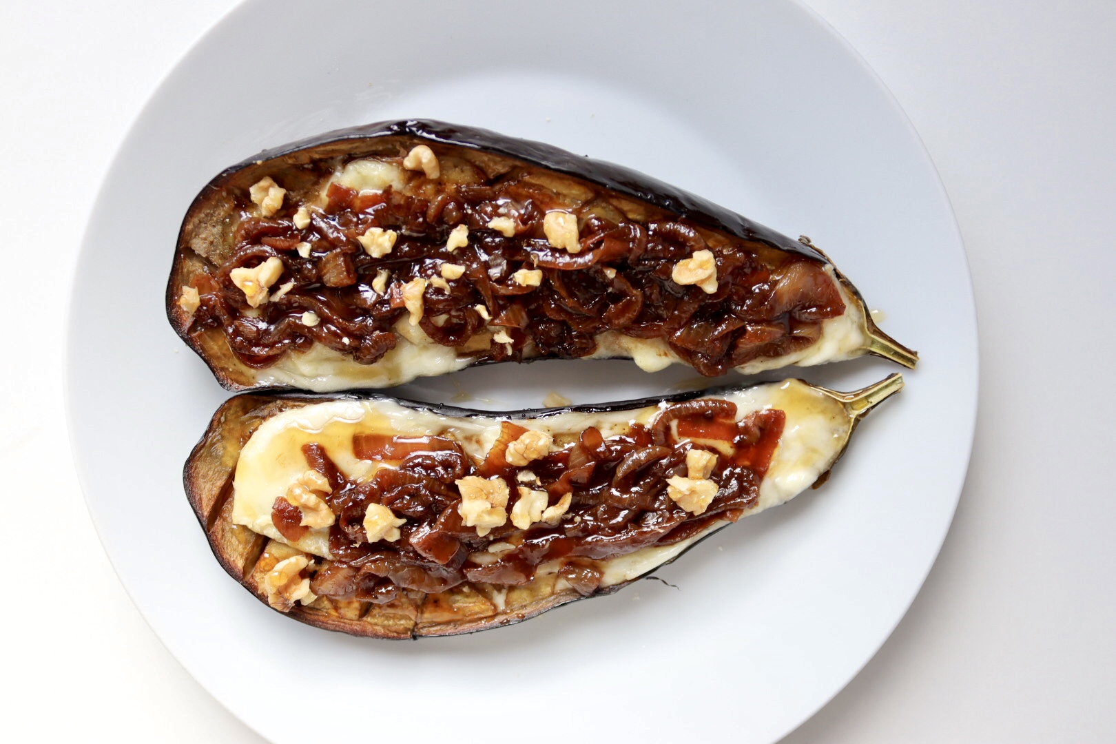 Foto de Berenjena con queso de cabra y cebolla